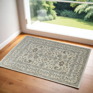 HomeRoots 4' Hand-Knotted Wool Area Rug with Floral Design and Tassel Fringe for Timeless Home Décor 2' X 3' 566291