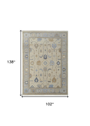 HomeRoots 4' Hand-Knotted Wool Area Rug with Floral Design in Gray, Ivory, and Blue – Timeless Elegance! 8' X 12' 566295