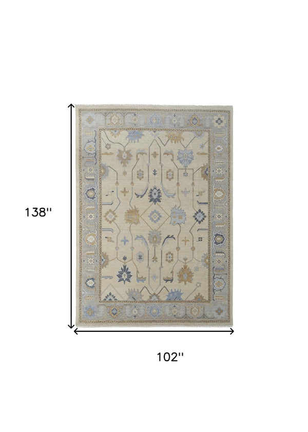 HomeRoots 4' Hand-Knotted Wool Area Rug with Floral Design in Gray, Ivory, and Blue – Timeless Elegance! 8' X 12' 566295