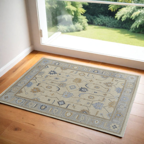 HomeRoots 4' Hand-Knotted Wool Area Rug with Floral Design in Gray, Ivory, and Blue – Timeless Elegance! 2' X 3' 566297