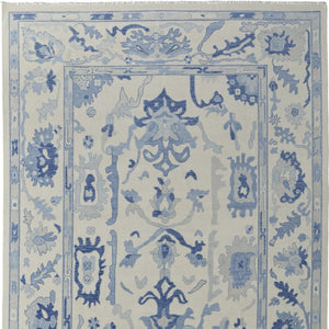 HomeRoots 4' Ivory and Blue Floral Hand-Knotted Wool Area Rug with Elegant Fringe for Timeless Home Style 6' X 9' 566299