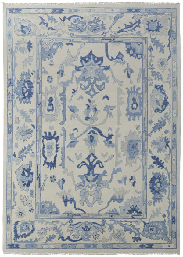 HomeRoots 4' Ivory and Blue Floral Hand-Knotted Wool Area Rug with Elegant Fringe for Timeless Home Style 6' X 9' 566299