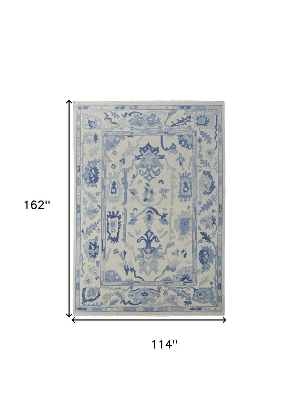 HomeRoots 4' Ivory and Blue Floral Hand-Knotted Wool Area Rug with Elegant Fringe for Timeless Home Style 9' X 13' 566302