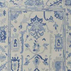 HomeRoots 4' Ivory and Blue Floral Hand-Knotted Wool Area Rug with Elegant Fringe for Timeless Home Style 2' X 3' 566303