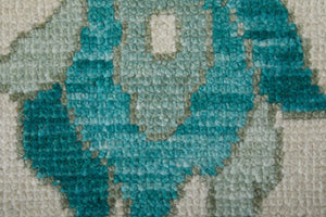 HomeRoots 4' Ivory and Blue Floral Hand-Knotted Wool Area Rug with Elegant Fringe for Timeless Home Style 4' X 6' 566304