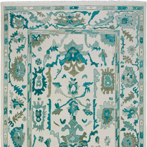 HomeRoots 4' Ivory and Blue Floral Hand-Knotted Wool Area Rug with Elegant Fringe for Timeless Home Style 4' X 6' 566304