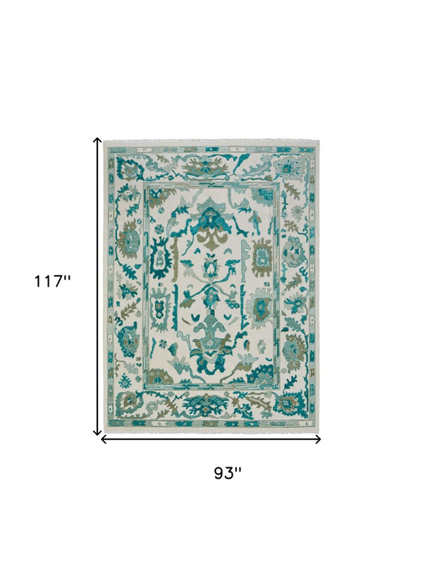 HomeRoots 4' Ivory and Blue Floral Hand-Knotted Wool Area Rug with Elegant Fringe for Timeless Home Style 8' X 10' 566306