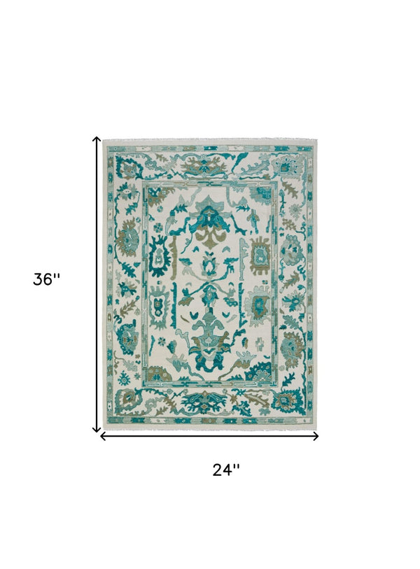 HomeRoots 4' Ivory and Blue Floral Hand-Knotted Wool Area Rug with Elegant Fringe for Timeless Home Style 2' X 3' 566309