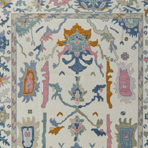 HomeRoots 4' Hand-Knotted Floral Wool Area Rug in Blue, Ivory & Pink - Durable, Stain-Resistant Design 6' X 9' 566311