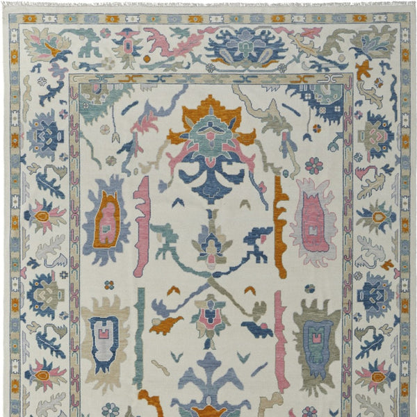 HomeRoots 4' Hand-Knotted Floral Wool Area Rug in Blue, Ivory & Pink - Durable, Stain-Resistant Design 6' X 9' 566311