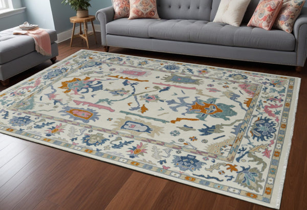HomeRoots 4' Hand-Knotted Floral Wool Area Rug in Blue, Ivory & Pink - Durable, Stain-Resistant Design 8' X 12' 566313
