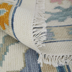 HomeRoots 4' Hand-Knotted Floral Wool Area Rug in Blue, Ivory & Pink - Durable, Stain-Resistant Design 2' X 3' 566315