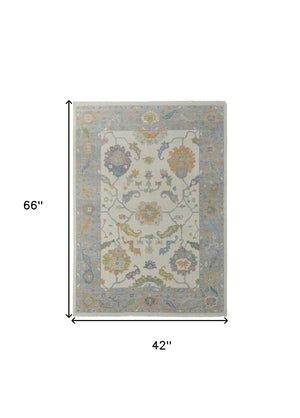 HomeRoots 4' Hand-Knotted Wool Area Rug with Gray, Ivory & Orange Floral Design - Elegant Fringed Finish 4' X 6' 566316