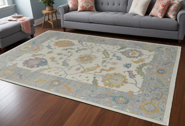 HomeRoots 4' Hand-Knotted Wool Area Rug with Gray, Ivory & Orange Floral Design - Elegant Fringed Finish 8' X 10' 566318