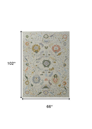 HomeRoots 4' Hand-Knotted Wool Area Rug with Floral Design in Gray, Ivory, and Gold - Cozy Elegance for Any Room 6' X 9' 566323