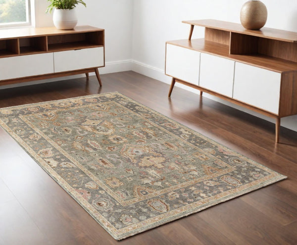 HomeRoots 4' Gray and Gold Hand-Knotted Wool Oriental Area Rug with Elegant Fringe for Timeless Home Style 4' X 6' 566401