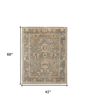 HomeRoots 4' Gray and Gold Hand-Knotted Wool Oriental Area Rug with Elegant Fringe for Timeless Home Style 4' X 6' 566401