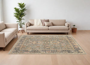 HomeRoots 4' Gray and Gold Hand-Knotted Wool Oriental Area Rug with Elegant Fringe for Timeless Home Style 6' X 9' 566402