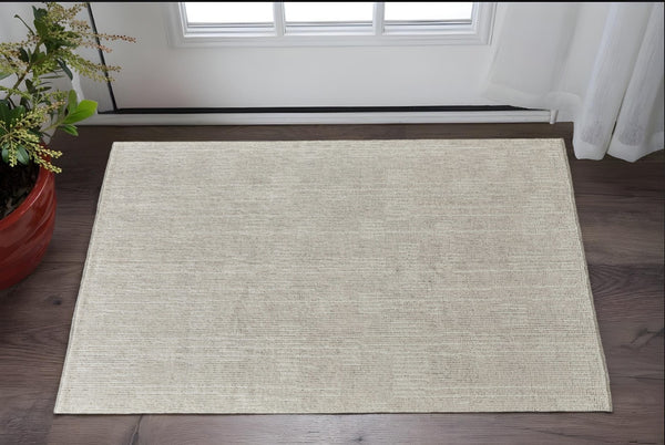 HomeRoots 4' Timeless Tan and Ivory Hand-Knotted Wool Area Rug for Cozy Homes, Durable and Easy to Maintain 2' X 3' 566441
