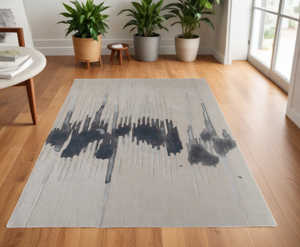 HomeRoots 4' Modern Abstract Hand-Tufted Area Rug in Gray, Ivory, and Blue - Calming Elegance for Any Room 4' X 6' 566456