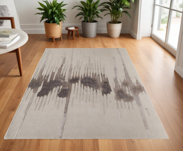 HomeRoots 4' Modern Abstract Hand-Tufted Area Rug in Gray, Ivory, and Blue - Calming Elegance for Any Room 4' X 6' 566463