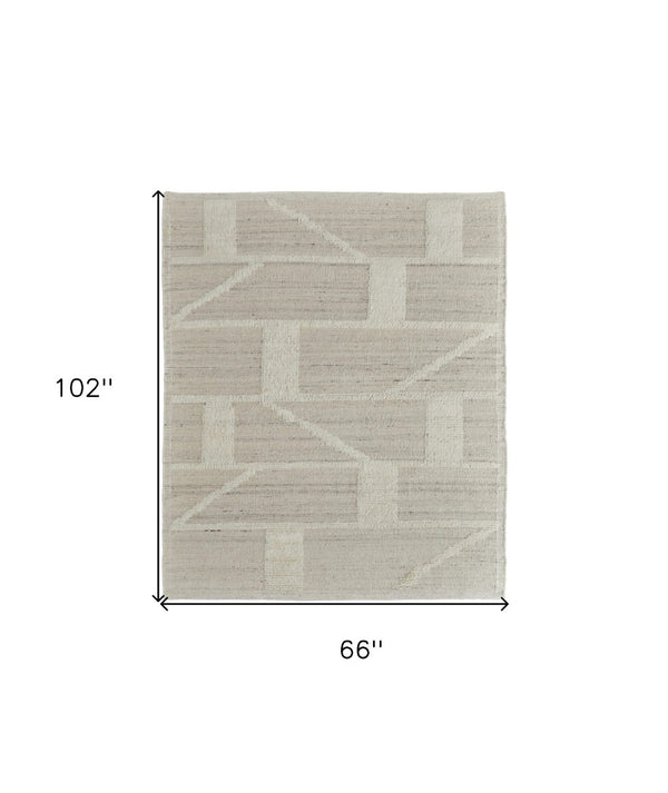 HomeRoots 4' Hand-Woven Wool Area Rug – Elegant Tan and Ivory Geometric Design for Cozy Living Spaces 6' X 9' 566545