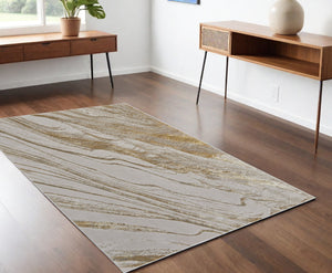 Homeroots 4' X 6' Ivory Brown And Gold Abstract Power Loom Area Rug Ivory Polyester 566581