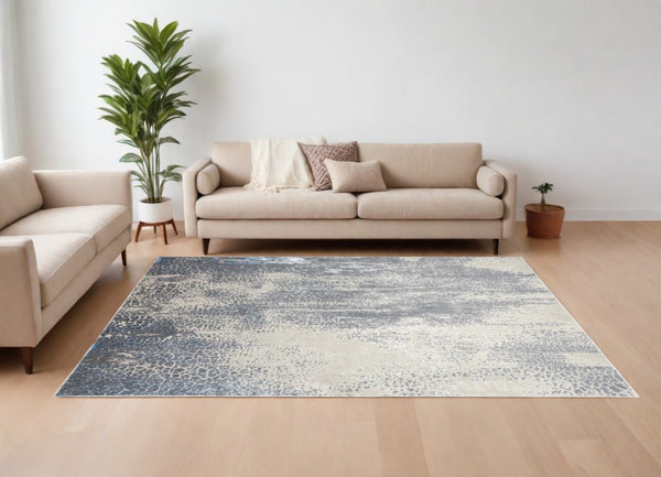 HomeRoots 8' Ivory Gray and Blue Abstract Area Rug – Durable, Stain-Resistant Design Perfect for Modern Homes 8' X 10' 566610
