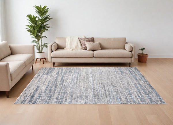 HomeRoots 8' Ivory Gray and Blue Abstract Power Loom Area Rug - Stylish, Durable, Easy to Maintain for Any Room 8' X 10' 566611