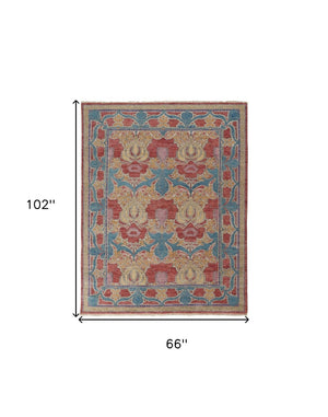 HomeRoots 4' Elegant Hand-Knotted Wool Oriental Area Rug in Vibrant Blue, Red, and Yellow for Timeless Style 6' X 9' 566613