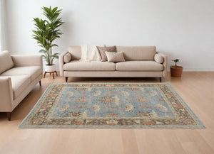HomeRoots 4' Timeless Hand-Knotted Wool Oriental Area Rug in Brown and Blue - Durable, Elegant Accent for Any Space 6' X 9' 566621