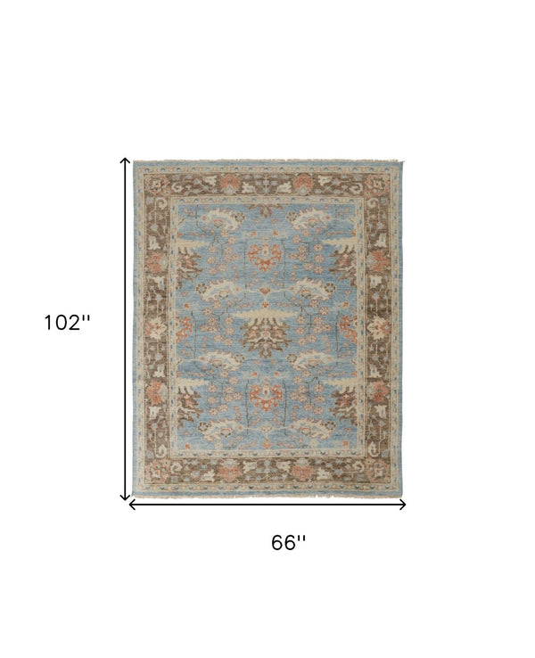 HomeRoots 4' Timeless Hand-Knotted Wool Oriental Area Rug in Brown and Blue - Durable, Elegant Accent for Any Space 6' X 9' 566621