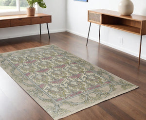 HomeRoots 4' Luxurious Hand-Knotted Wool Area Rug with Floral Design in Soft Ivory, Gray, and Pink Tones 4' X 6' 566628