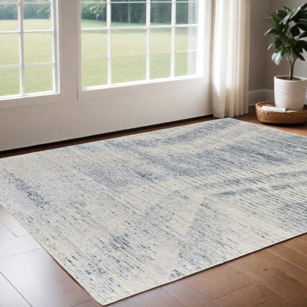 HomeRoots 3' Ivory Gray and Blue Abstract Hand-Knotted Area Rug - Elegant Soft Wool-Blend for Modern Spaces 3' X 5' 566636