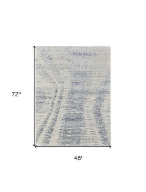 HomeRoots 3' Ivory Gray and Blue Abstract Hand-Knotted Area Rug - Elegant Soft Wool-Blend for Modern Spaces 4' X 6' 566637