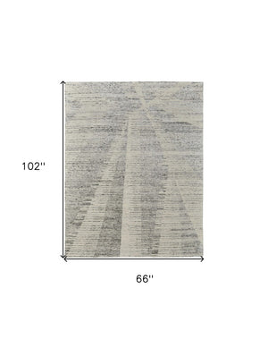 HomeRoots 3' Hand-Knotted Distressed Area Rug in Ivory, Blue & Silver - Modern Abstract Design for Your Home 6' X 9' 566653