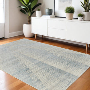 HomeRoots 3' Hand-Knotted Distressed Area Rug in Ivory, Blue & Silver - Modern Abstract Design for Your Home 4' X 6' 566659