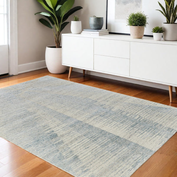 HomeRoots 3' Hand-Knotted Distressed Area Rug in Ivory, Blue & Silver - Modern Abstract Design for Your Home 4' X 6' 566659