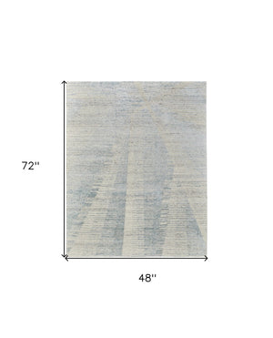 HomeRoots 3' Hand-Knotted Distressed Area Rug in Ivory, Blue & Silver - Modern Abstract Design for Your Home 4' X 6' 566659