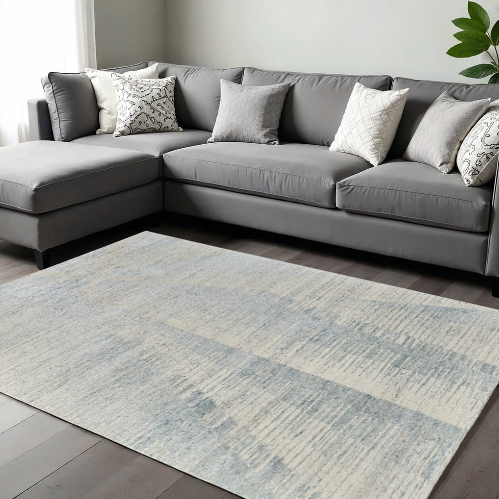 HomeRoots 3' Hand-Knotted Distressed Area Rug in Ivory, Blue & Silver - Modern Abstract Design for Your Home 6' X 9' 566660