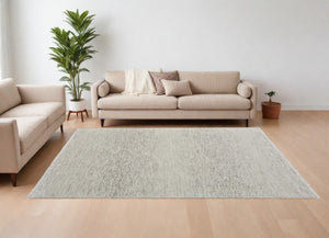 HomeRoots 8' Ivory and Gray Wool Hand-Knotted Area Rug with Fringe - Timeless Style for Any Space 9' X 13' 566675