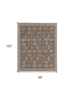 Homeroots 6' X 9' Tan And Brown Wool Oriental Hand Knotted Area Rug With Fringe Brown Wool 566762