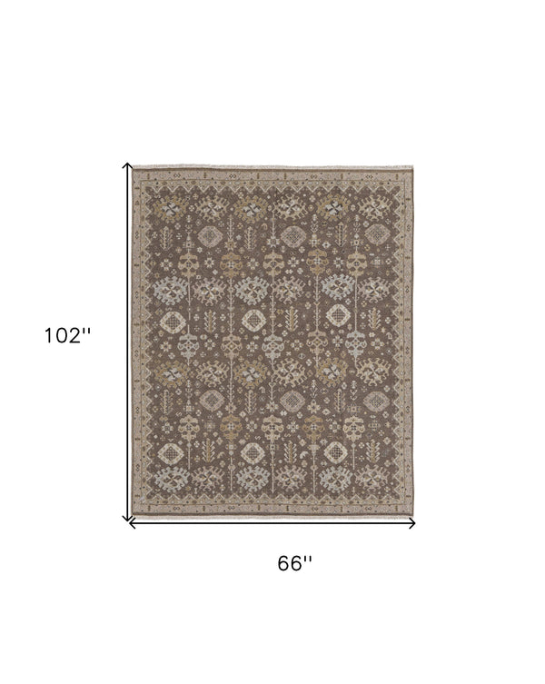 Homeroots 6' X 9' Tan And Brown Wool Oriental Hand Knotted Area Rug With Fringe Brown Wool 566762
