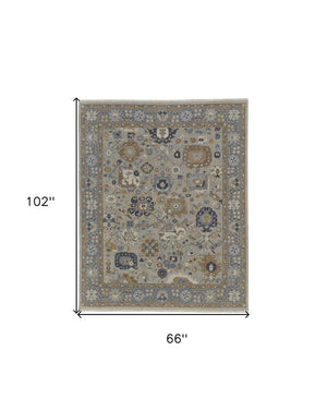 HomeRoots 4' Timeless Gray and Brown Hand-Knotted Wool Oriental Area Rug with Artisan Fringe Detail 6' X 9' 566781