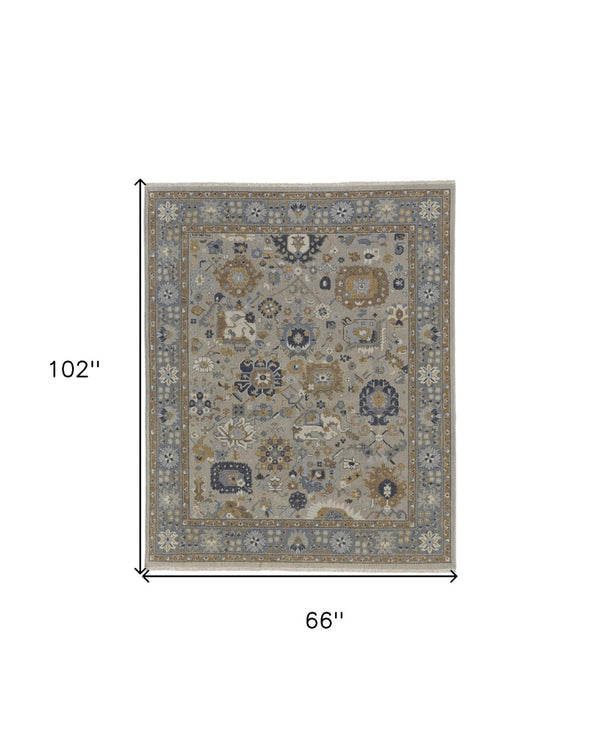 HomeRoots 4' Timeless Gray and Brown Hand-Knotted Wool Oriental Area Rug with Artisan Fringe Detail 6' X 9' 566781