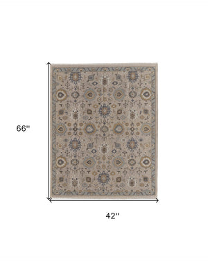 HomeRoots 4' Hand-Knotted Wool Oriental Area Rug in Tan, Brown, and Gray with Elegant Fringe Detail 4' X 6' 566794