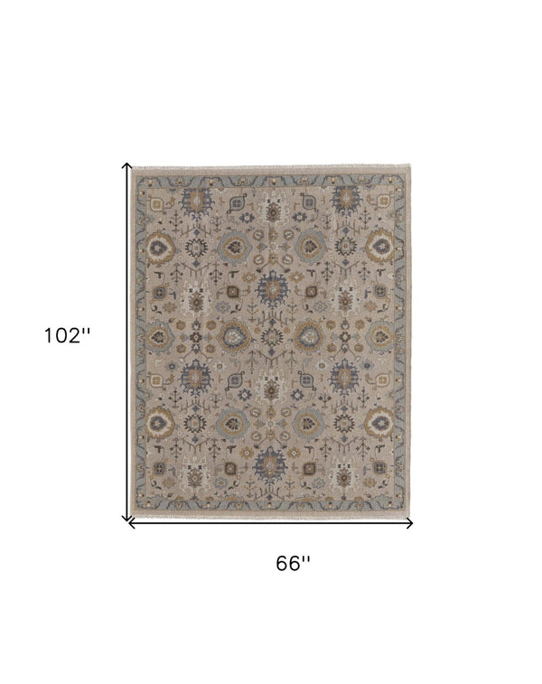 HomeRoots 4' Hand-Knotted Wool Oriental Area Rug in Tan, Brown, and Gray with Elegant Fringe Detail 6' X 9' 566795