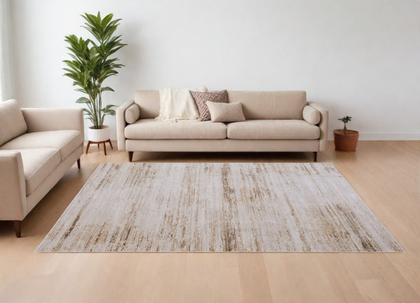 HomeRoots 5' Ivory and Tan Abstract Area Rug - Modern Power Loom Design for Stylish Living Spaces 7' X 10' 566841