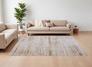 HomeRoots 5' Ivory and Tan Abstract Area Rug - Modern Power Loom Design for Stylish Living Spaces 9' X 13' 566843