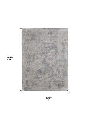 HomeRoots 3' Hand Woven Gray and Ivory Abstract Area Rug – Artisan Crafted for Modern Homes and Cozy Spaces 4' X 6' 566861